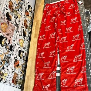 Soft and silky Budweiser pajama bottoms
Waist measures 15 laying flat 
Inseam 30